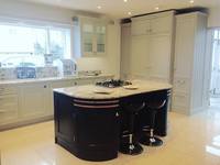 Pavilion Gray main kitchen and hague blue island with a granite blue ice sensa protected worktop.